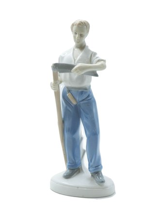 Figurine “Farmer Sharpening a Scythe”